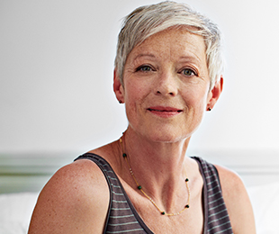 beautiful senior woman with pixie grey hair funeral cover plans